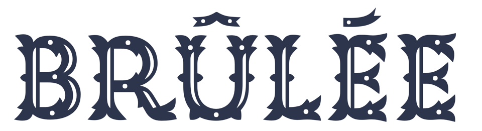 The word Brûlée, in LTR Very Bauble, showing of a circumflex and an acute. A desset this typeface!