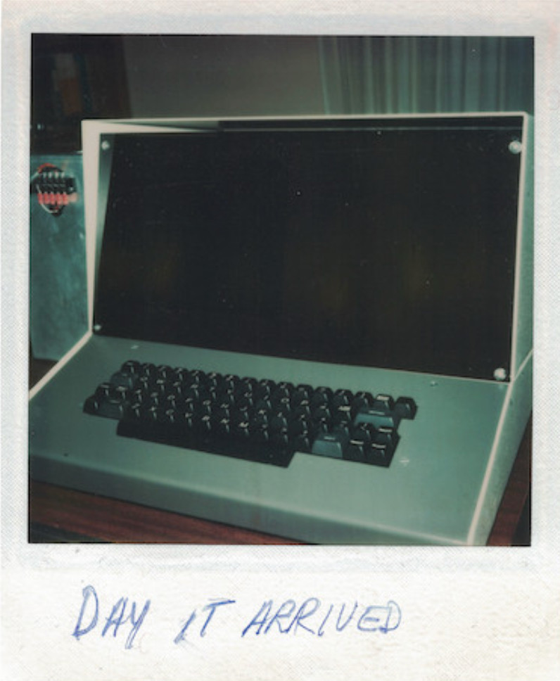 Polaroid of Sphere computer with caption DAY IT ARRIVED