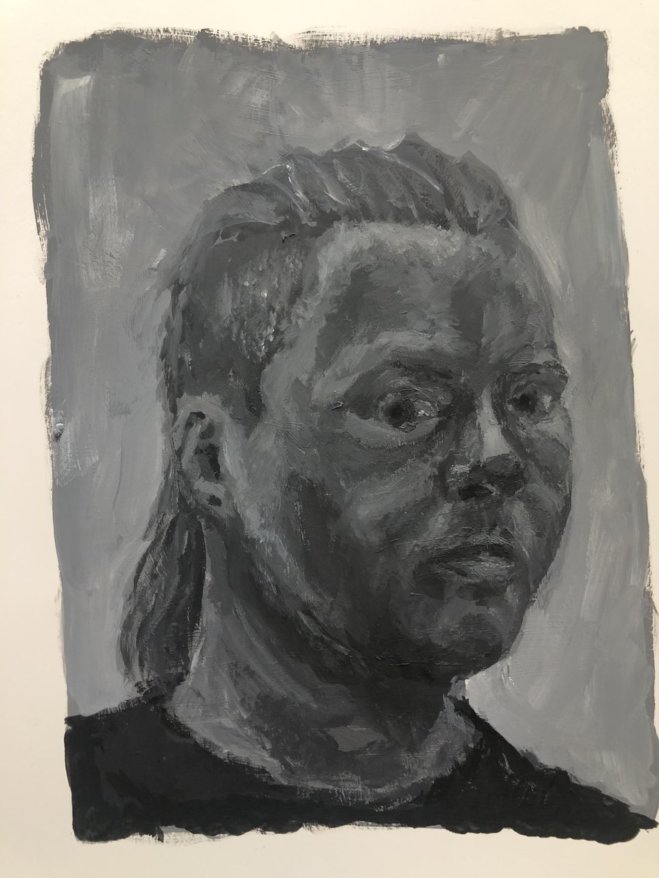 In which the same white person, still painted in shades of gray, looks to one side.