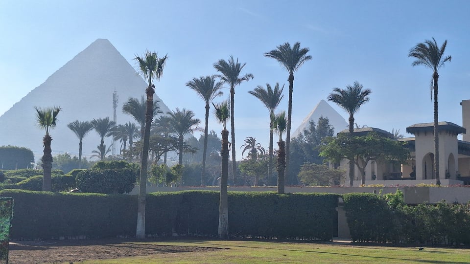 Pyramids hovering in the haze and distance