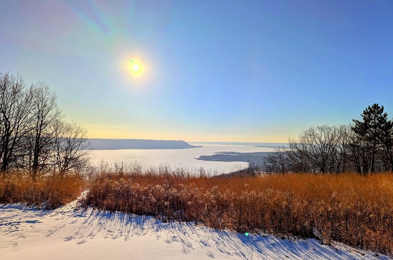 Even in our land of ice and snow, there is no shortage of color in the winter. Here’s some at the park’s main overlook, also called Garrard Bluff, which offers a beautiful view of Lake Pepin every day of the year. / Photo by Jake Gaster
