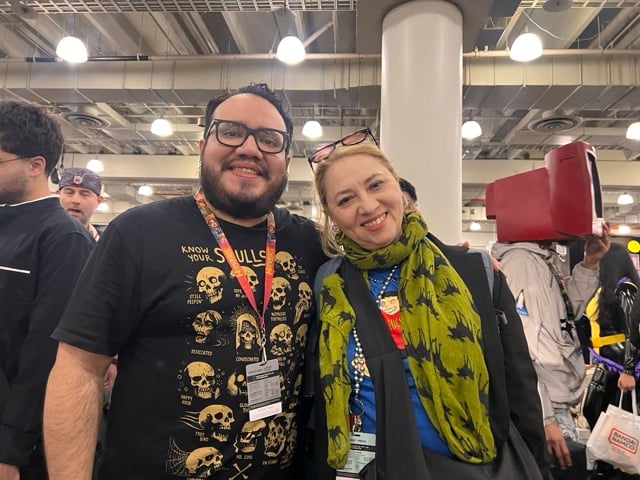 a man and a woman at a convention