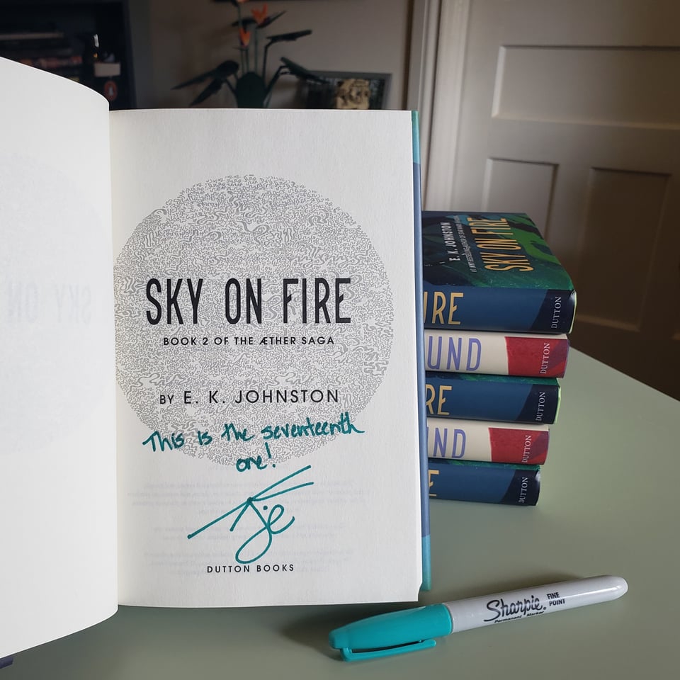 a copy of EK Johnston's Sky On Fire signed "this is the 17th one"