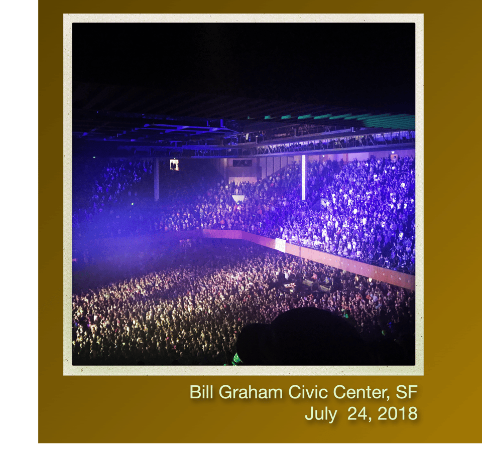 actual photo of bill graham with slow llama sign