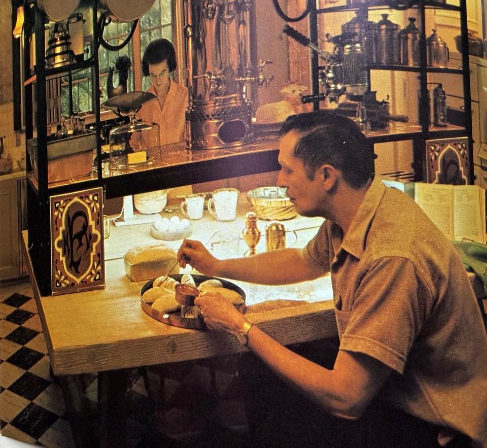 photo of Vincent and Mary Price prepping a meal in their Los Angeles kitchen from the book A Treasury of Great Recipes