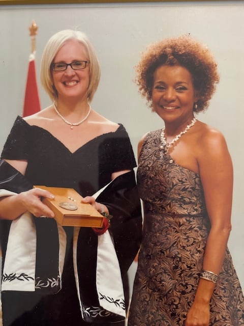 The Governor General of Canada and Kate Pullinger in formal dress at a prize ceremony