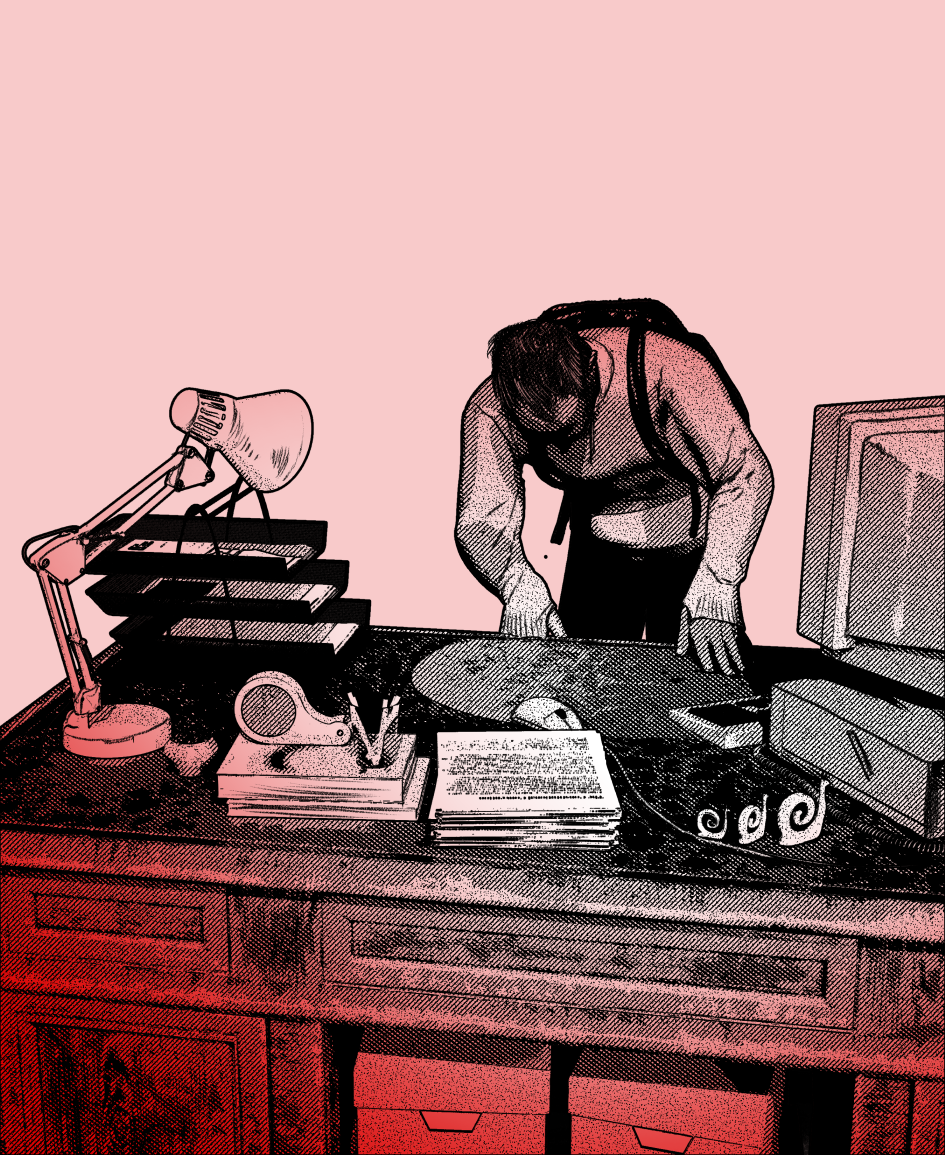 person searching in desk