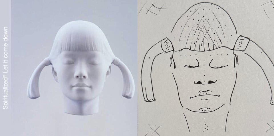 A sculpture of the head of a young woman in some kind of white material. The woman has her eyes closed. Her hair has bangs cut straight across, with a pig tail on each side, jutting out in a curved comma.