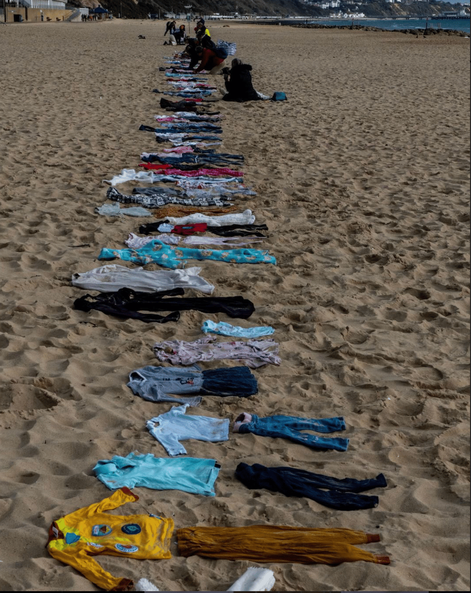 a line of clothes on the beach