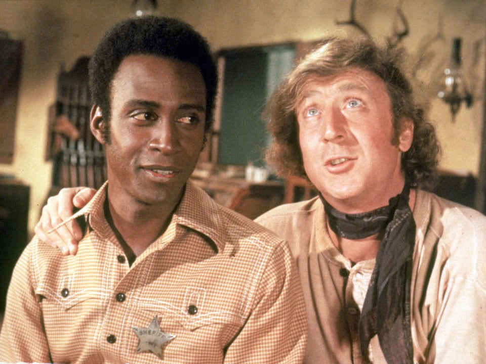 L-R: Cleavon Little and Gene Wilder in Blazing Saddles.