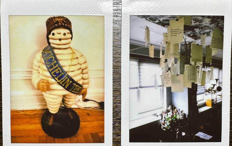 Photo of 2 Instax vertical pictures: left is of a statuette of Bibendum, the Michelin man, wearing a fez; right is of a pendant light decorated by a variety of notes, with a bar cart near the window in the background