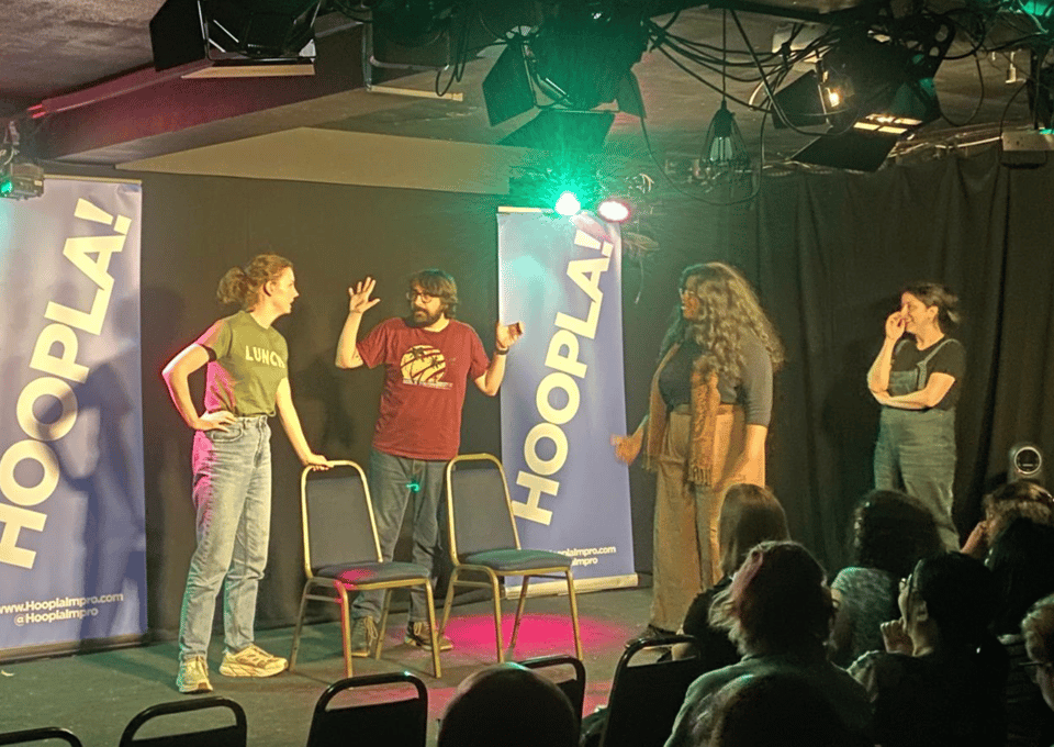 actors on a stage improvising