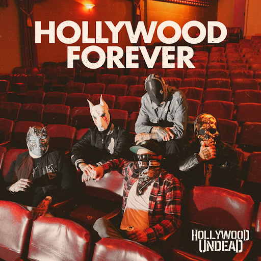 Hollywood Forever single cover. The group sits in leather theater seats.