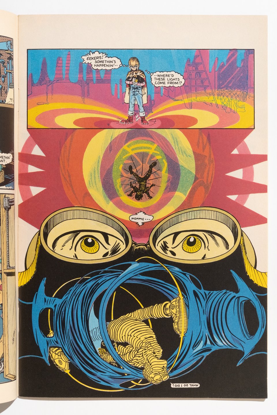 a page by Marshall Rogers from Eclipse Monthly 1. it is composed of color overlays on the line art in abstract patterns with a big set of eyes in the middle of the page.