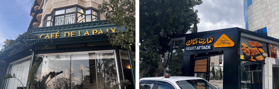 Two restaurants; one called Café de la Paix, and the other called Heart Attack (the latter with Arabic writing in addition to English)
