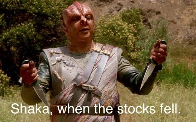 I apologise, but I don't know Star Trek very well. This is a screenshot of a weird looking alien guy holding two knives. The subtitle reads: "Shaka, when the stocks fell."