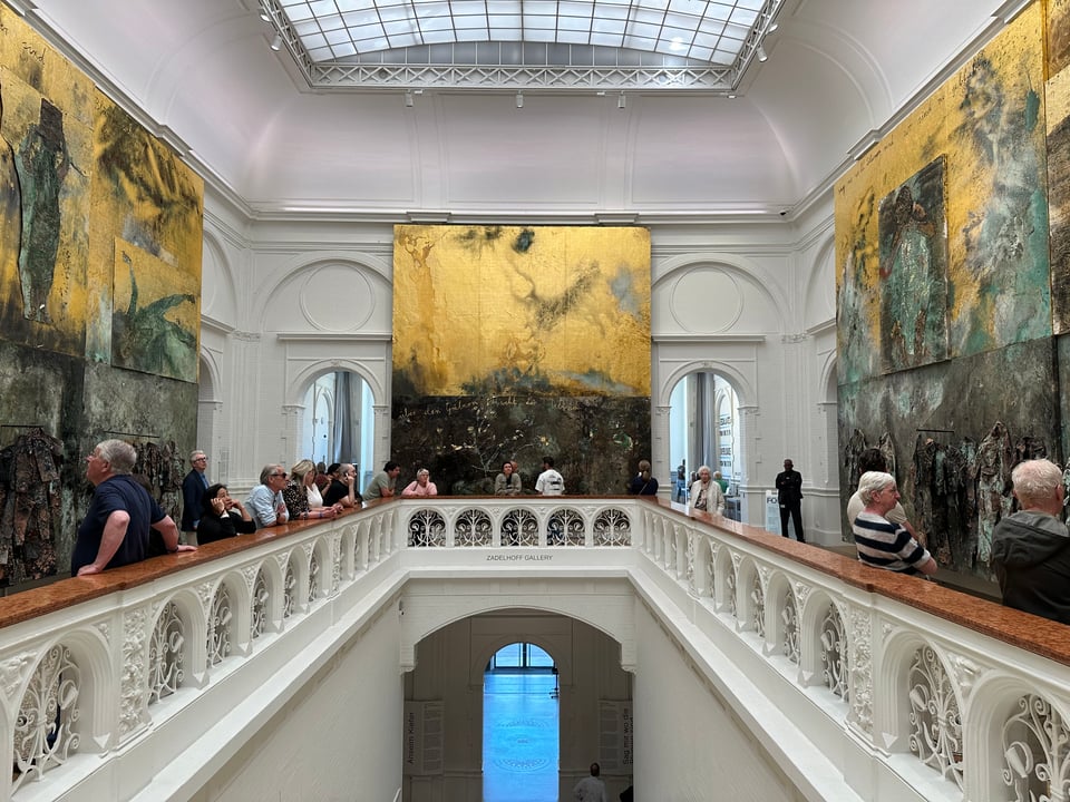 photo of some of Anselm Kiefer's "Sag mir wo die Blumen sind" artwork, covering all 3 walls in view at the top of the stairs of the Stedelijk Museum