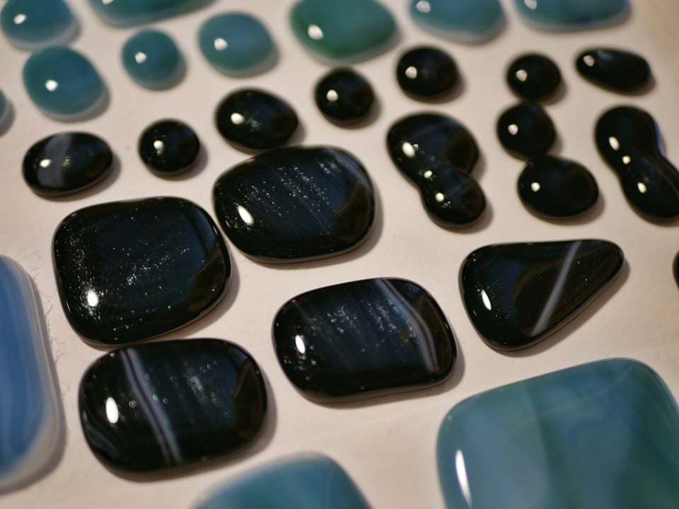 zoom in on the sparkly black cabochons