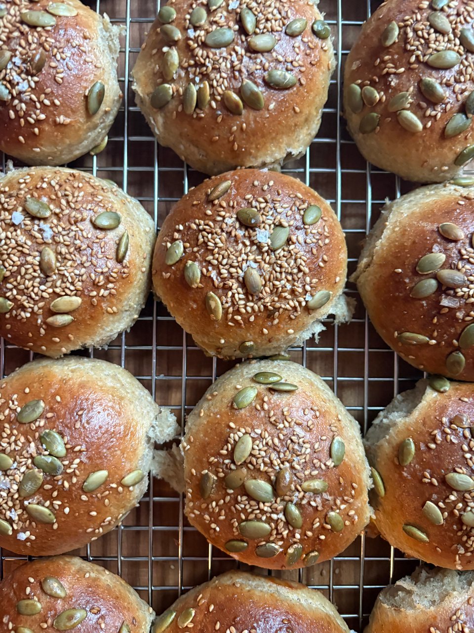Baked rolls topped with generous sprinklings of toasted sesame and pumpkin seeds.