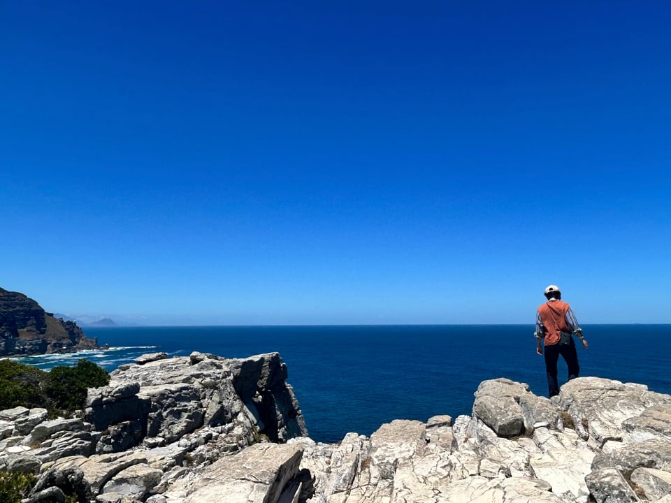Me on a cliff, overlooking Cape of Good Hope