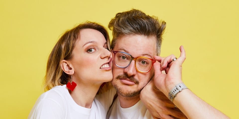 The Newlyweds smoosh their faces together.