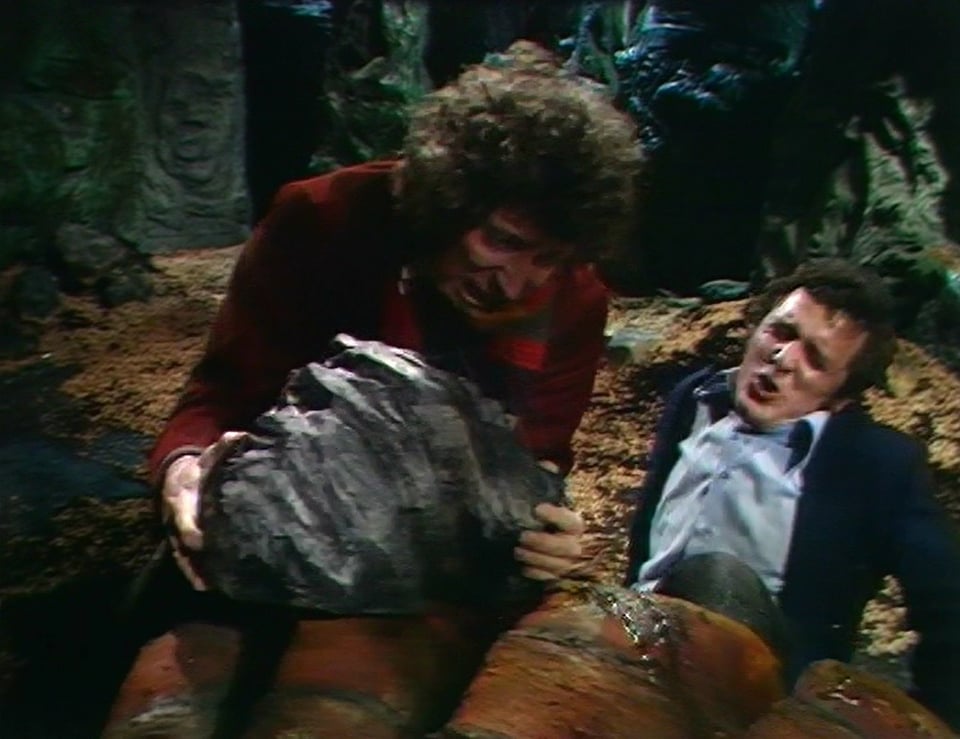 A screenshot of the Doctor trying to rescue Harry from the giant claim (from Time Space Visualizer)
