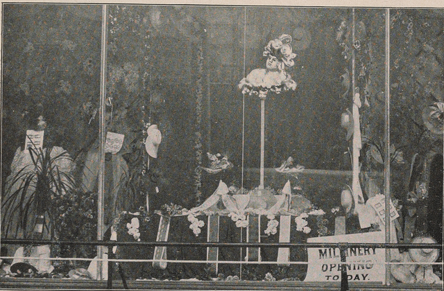 Photo, poor quality, of a woman's head floating in a window on a pole