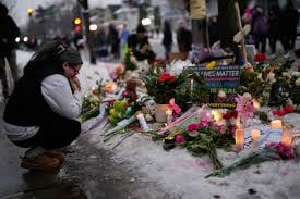 A makeshift memorial near the site where Renee Good was shot and killed in Minneapolis.