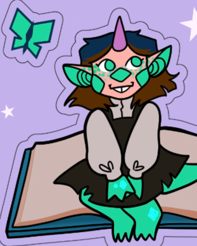 Ellie is sitting on a big book.