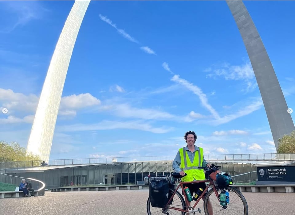 aidan in front of the gateway arch in st louis