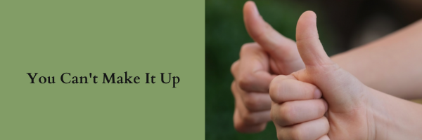 Two hands with thumbs up