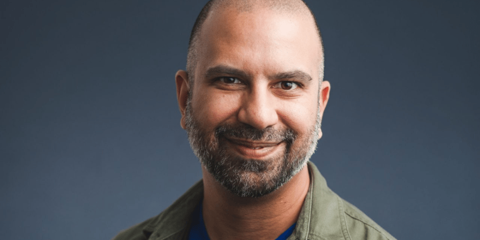 Vinny smiling at the camera.