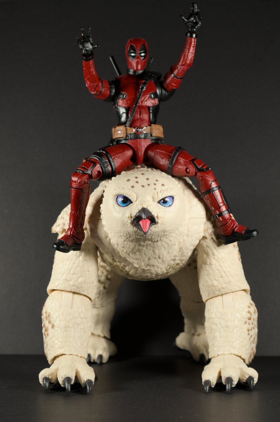 Deadpool on top of an Owlbear
