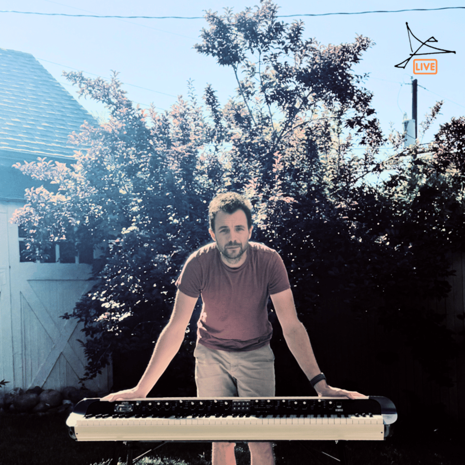 a man holding a keyboard