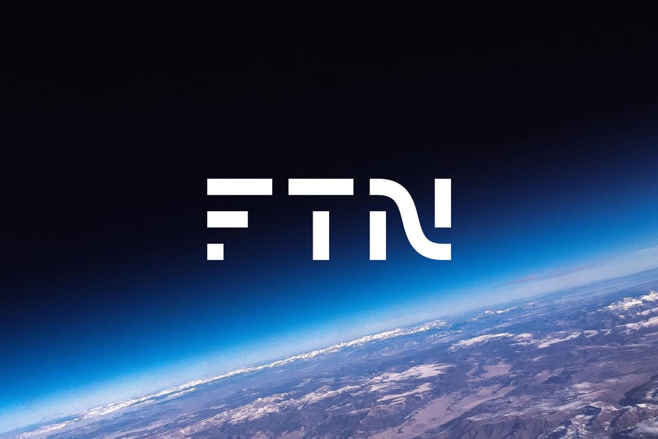 FTN white logo custom type shown above tight crop of Earth seen from space