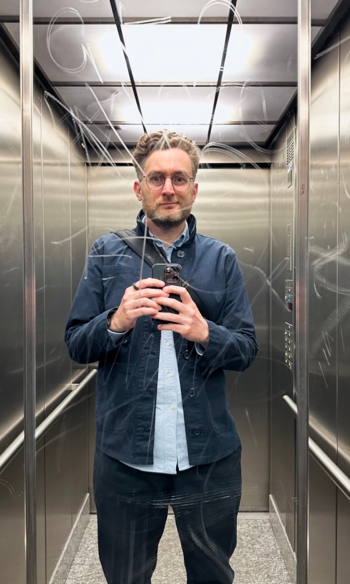 Johannes taking a selfie in an elevator