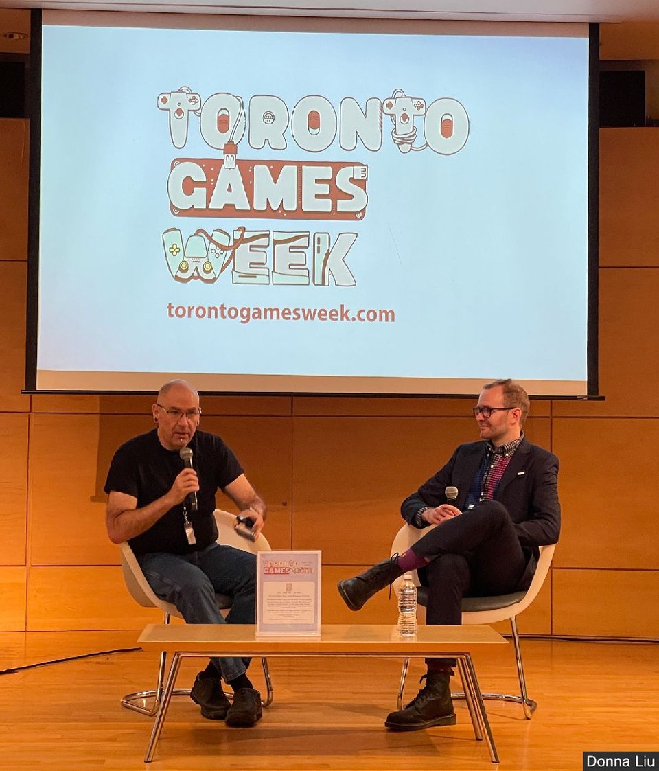 Derek Quenneville and Phil Salvador on stage at Toronto Reference Library