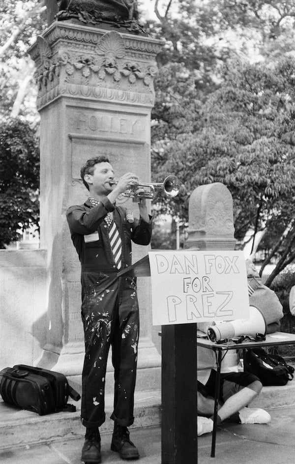 president hopeful dan fox plays trumpet at his announcement