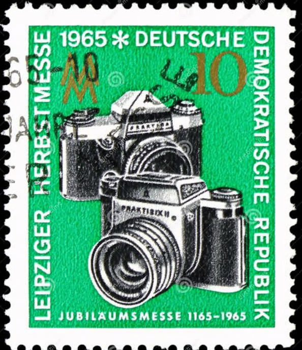 A postage stamp from the DDR featuring a couple cameras