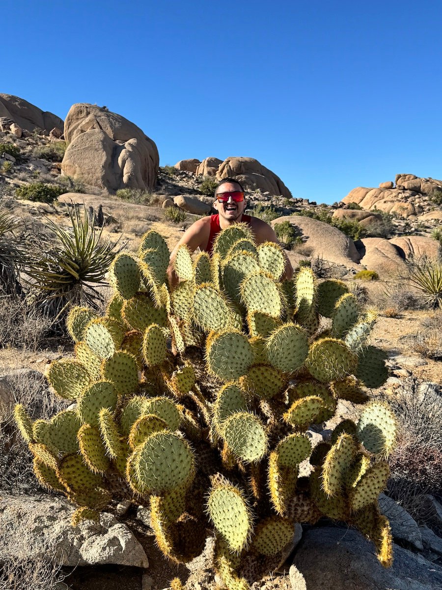 The author in front of a cactus.