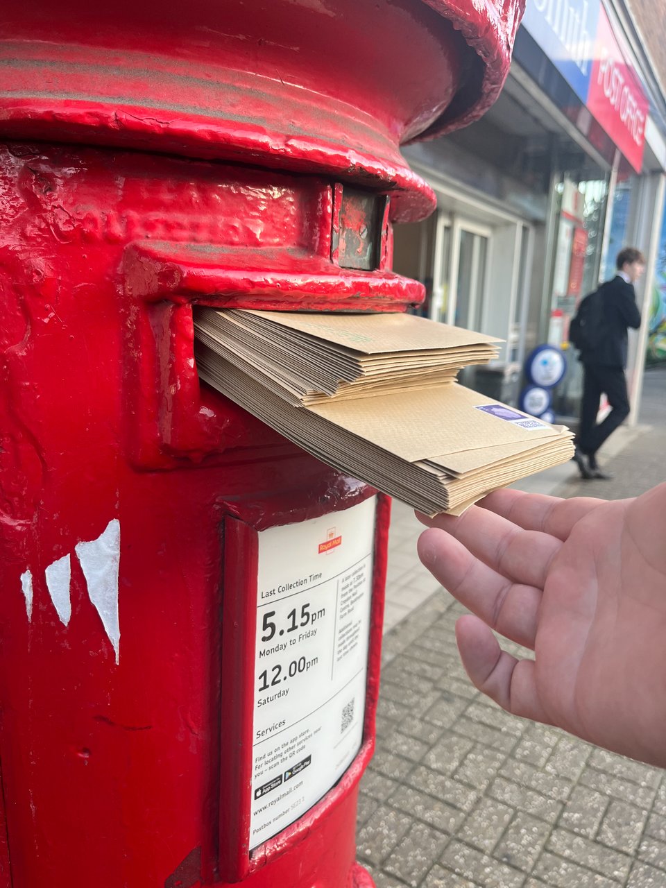 Jamming a post box with 60+ envelopes with this month's listings