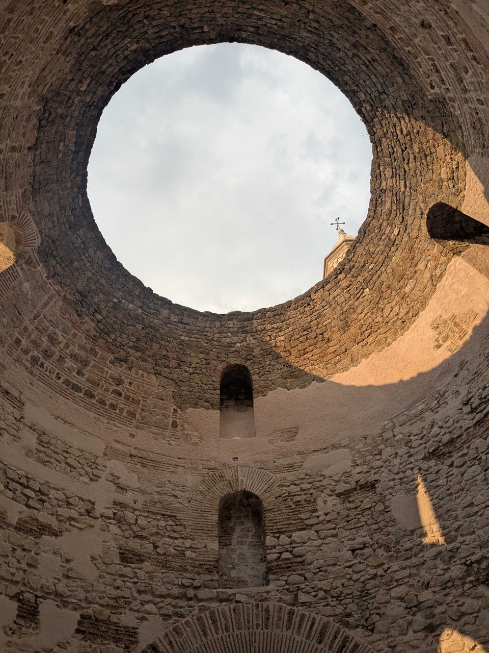the inside of a stone tower - Diocletian's Palace