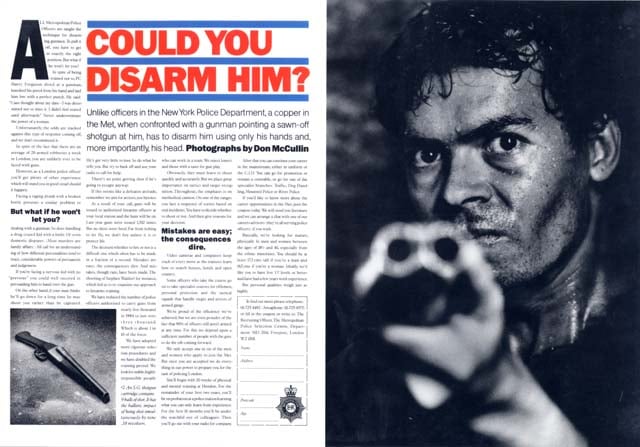 A press advertisement for the Metropolitan Police. There is a black and white photograph of a man with a look of steely determination on his face. He is pointing a sawn-off shotgun directly towards the camera. The headline reads, "COULD YOU DISARM HIM?"
