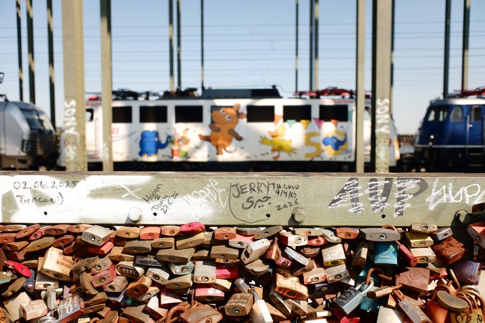 Train in Cologne on the main "lock" bridge