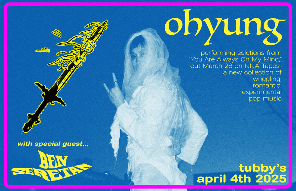 a woman in a bridal-type outfit turns to face the camera and throws up the let's rock devil horns next to a drawing of a flaming sword