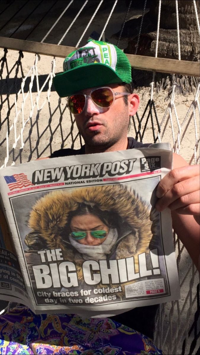 Sufjan, with a nose bespeckled with sun tan lotion, scantily clad in a hammock in the sun, reading about the horrible winter storm that descended upon NYC in Winter 2015.