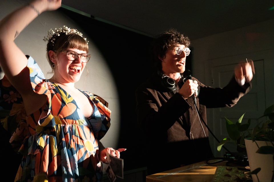 Lizzie and Nic making announcements.