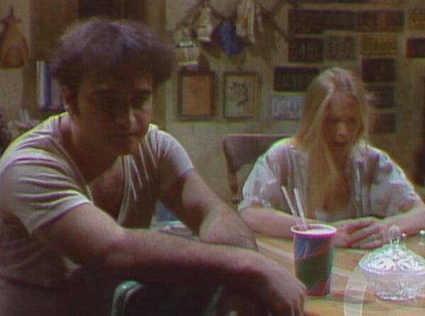 two people sitting at a table