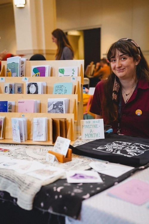 a person at a zine festival