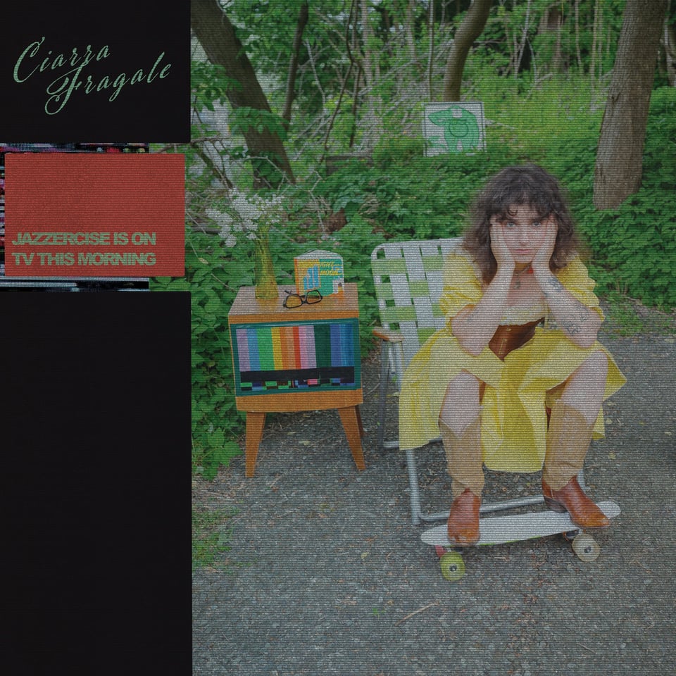 the artist Ciarra Fragale sits in a backyard folding lawn chair in a yellow dress and cowboy boots, her feet on a tiny 80s skateboard